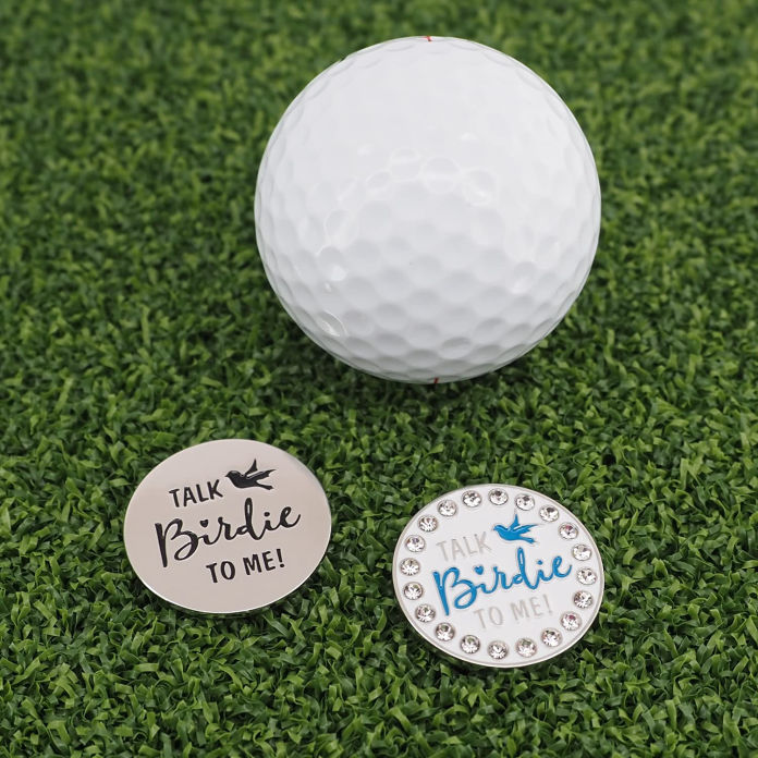 Golf Ball Marker next to ball on green